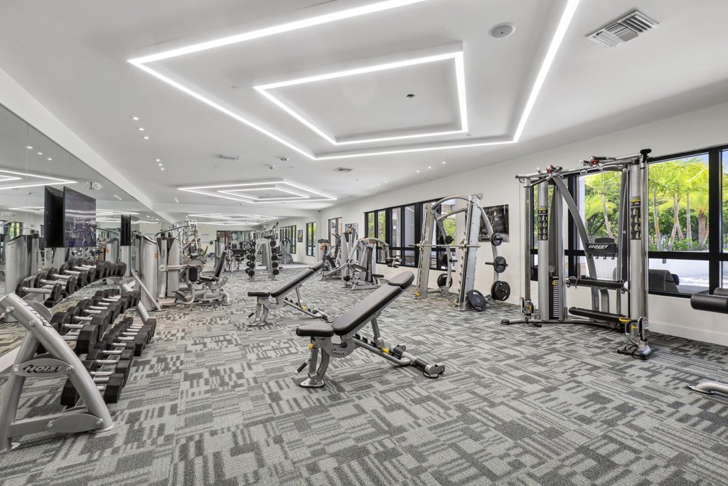 Resident Fitness Center featuring Hi-Tech Cardio Gear & Free Weights at Westgate on University in Lauderhill, FL