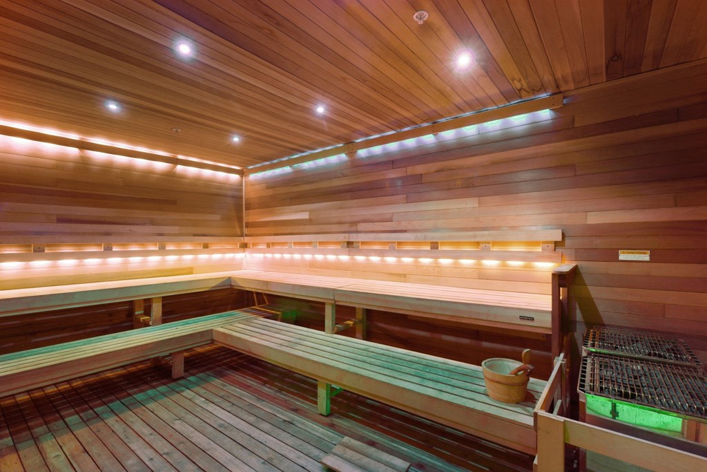 Steam Room with wooden benches at Westgate on University in Lauderhill, FL