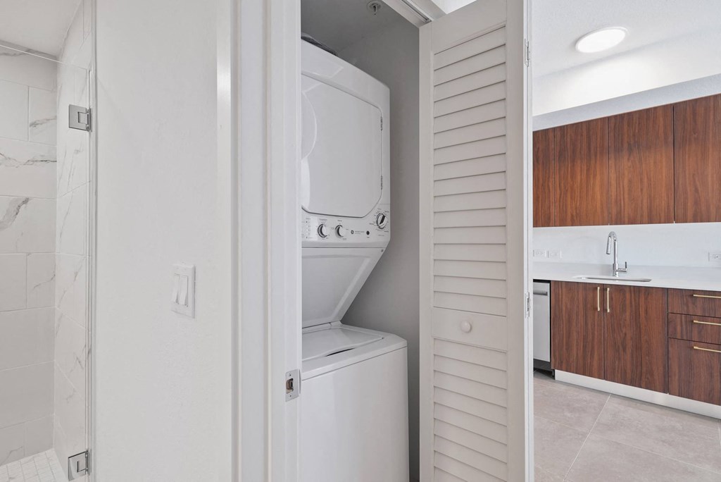 a laundry room with a washer and dryer