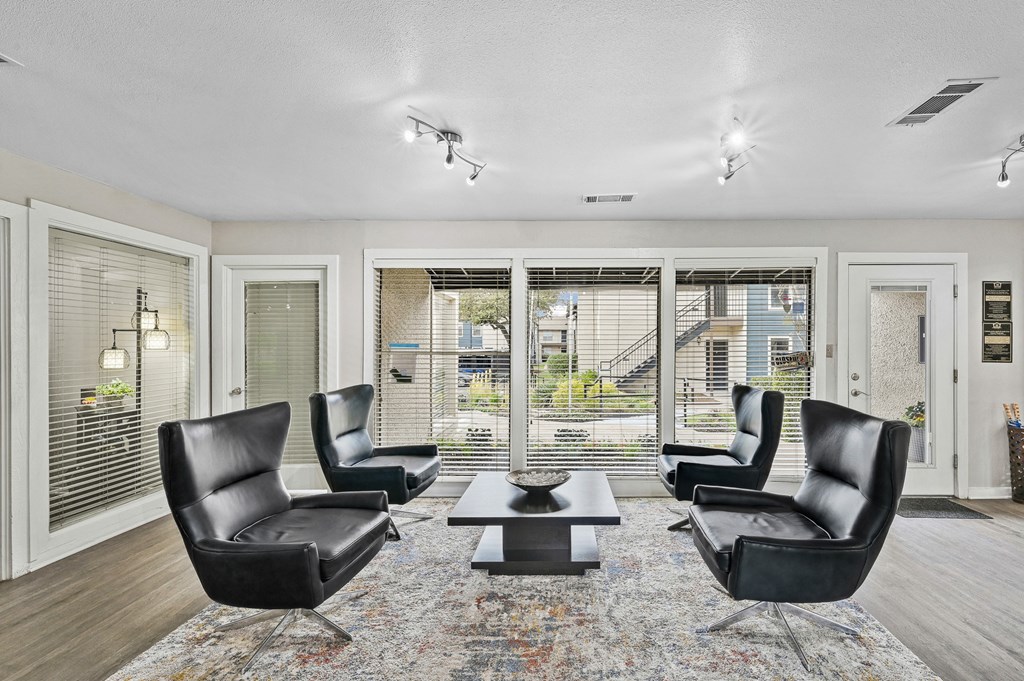 Waiting area seating of leasing office at Windridge in Dallas, TX