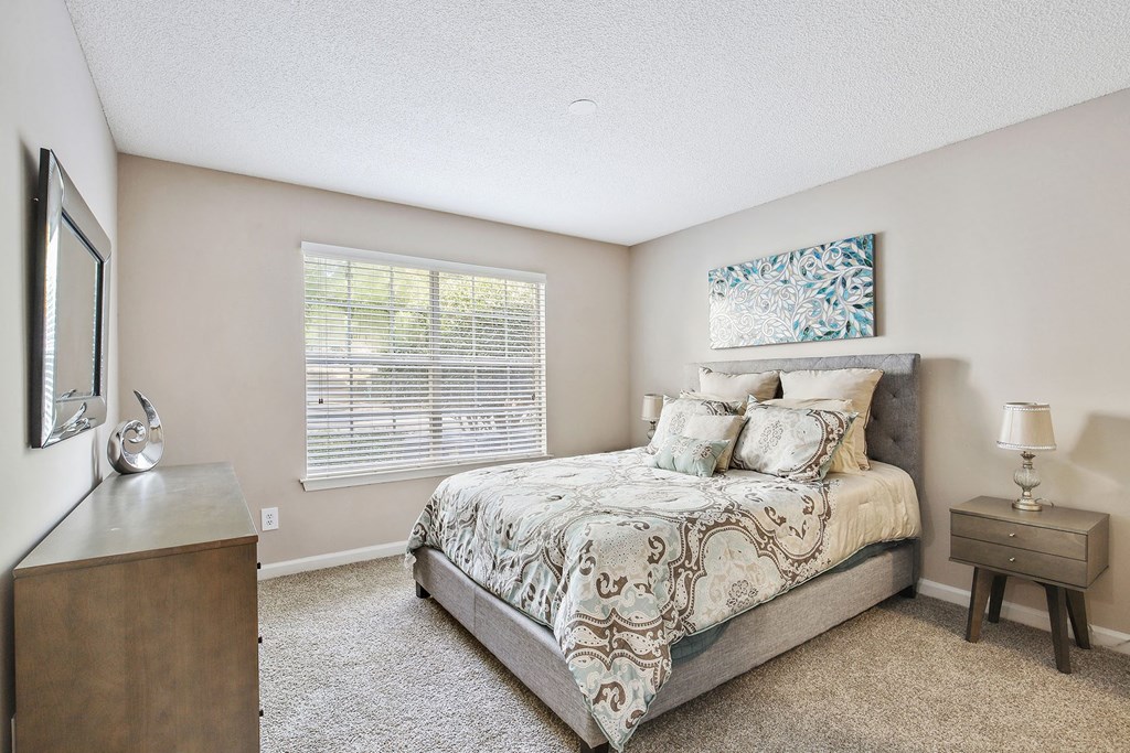 A Bedroom with a bed and a window at Wellington Ridge in Lawrenceville, GA
