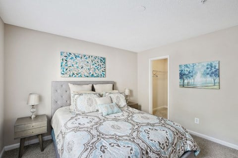 our apartments offer a bedroom with a bed and a closet