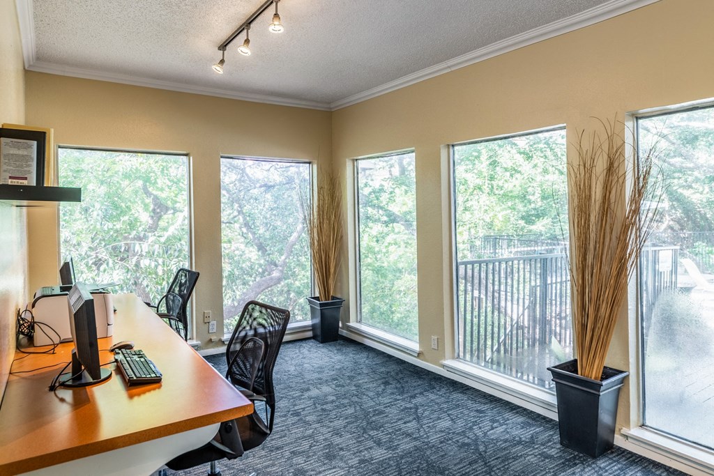 the preserve at ballantyne commons conference room with large windows and a desk