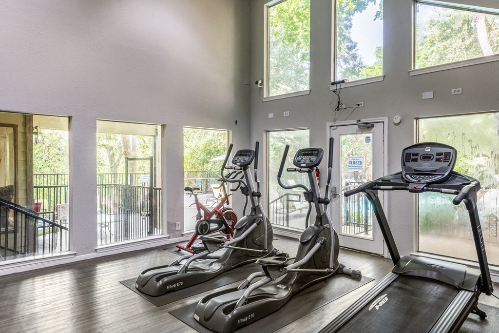 the residence on lamar apartment homes fitness room with cardio equipment