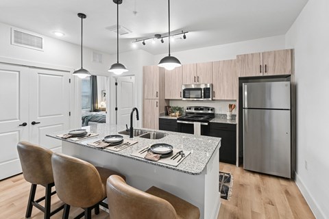 Kitchen of Model Unit at Whispering Pines in Euless, TX