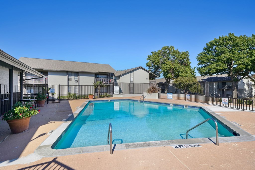 a main view of the swimming pool at Woodlands of Plano in Plano, TX