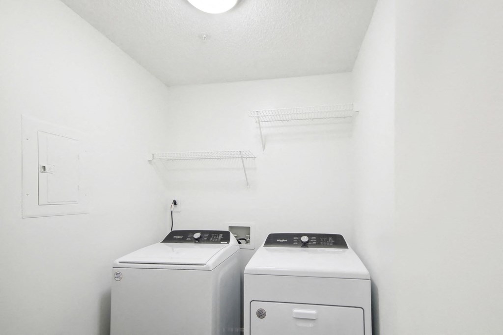 an empty laundry room at Arrowood Crossing in Charlotte, NC