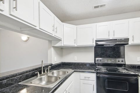 a kitchen at Arrowood Crossing in Charlotte, NC