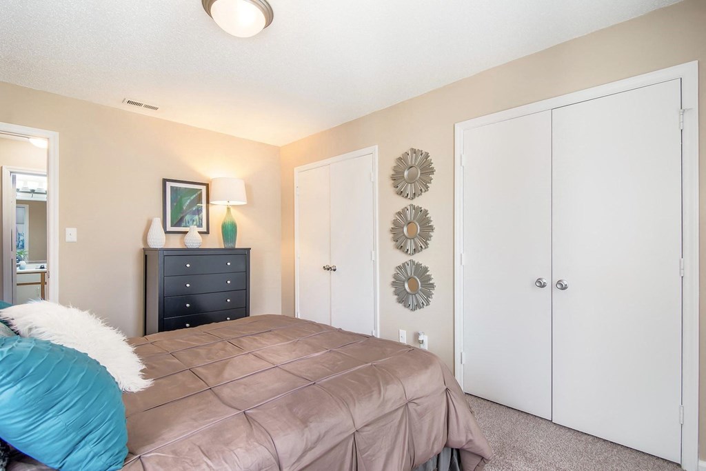 Model home bedroom at Arrowood Crossing Apartments in Charlotte, NC