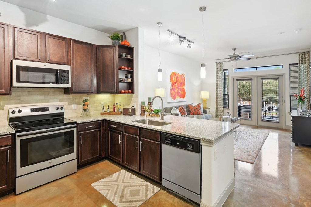 a kitchen at Allusion at West University, Houston, TX