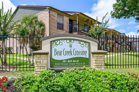 bear creek crossing apartments community sign