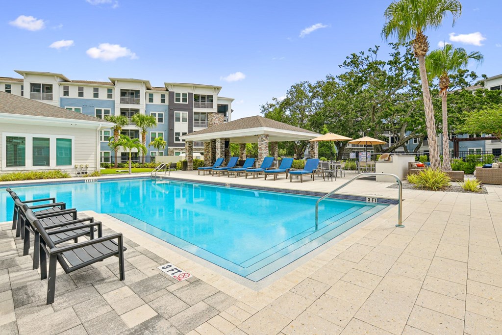 Steps leading into our pool at Dunedin Commons apartments in Dunedin, FL