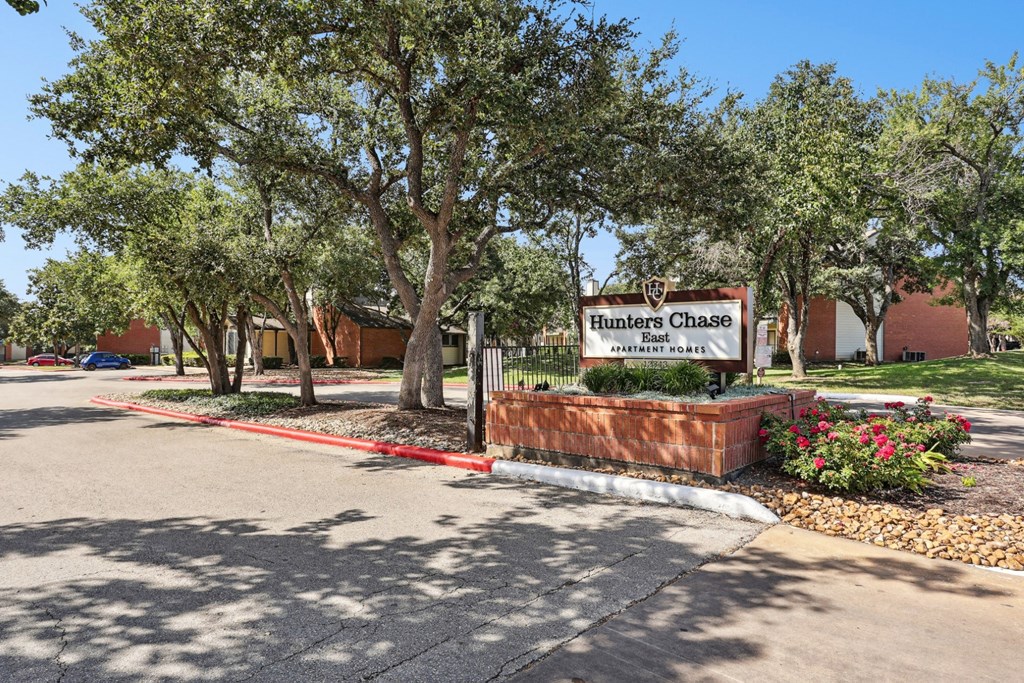 Property signage at the entrance area at Hunters Chase in Austin, TX