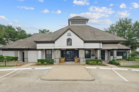 Exterior view of the leasing office for Jefferson Place apartments in Irving, TX