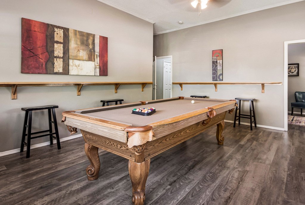 the preserve at ballantyne commons pool table and bar area with stools