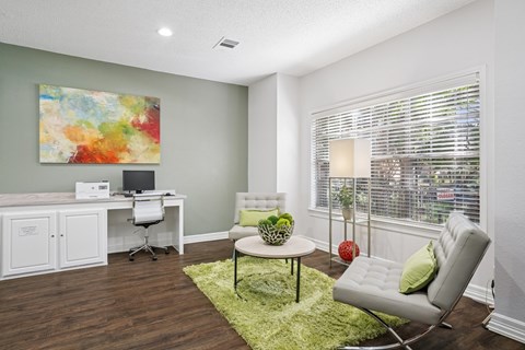 Business center with computer, printer, and seating with a coffee table at La Costa in Plano, TX