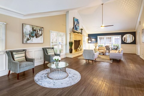 a living room filled with furniture and a fire place