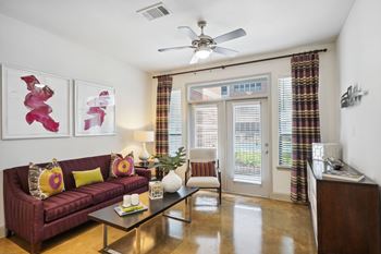 a living room at Muse at Museum District, Houston, TX