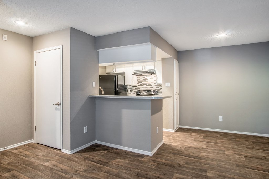Kitchen and Dining Area at The Players Club Apartments in Nashville, TN