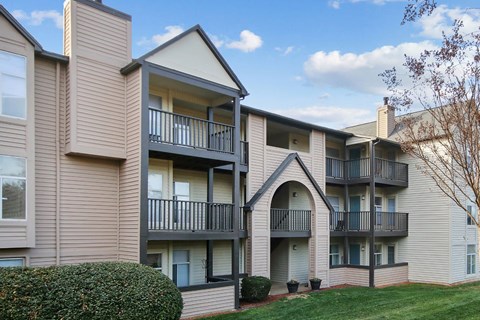 exterior view 
of Sabal Point Apartments in Pineville, NC