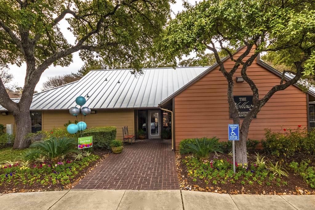 Clubhouse Exterior at The Hollows Apartments in San Antonio, TX
