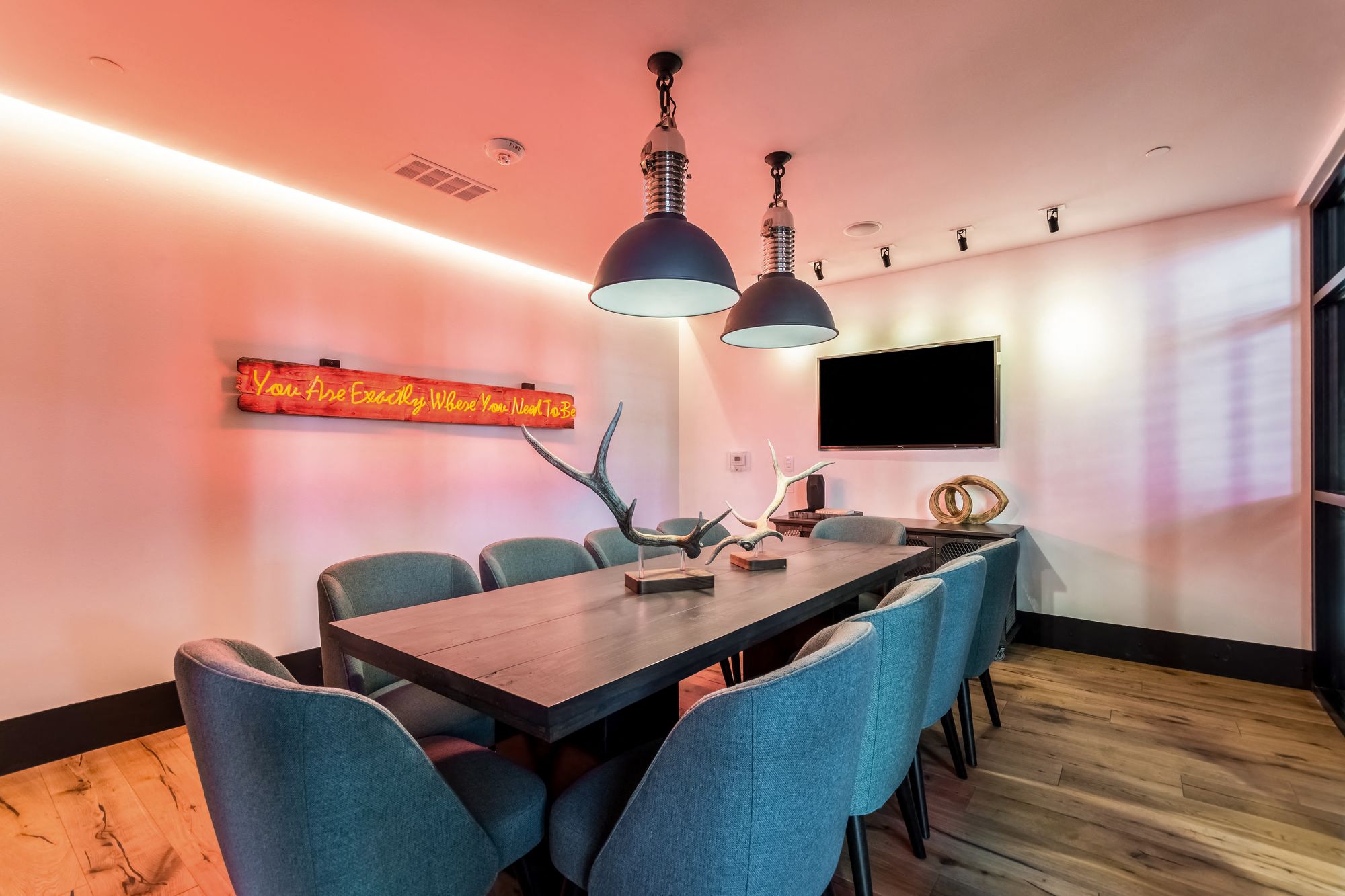 Coworking space with large table at the case building apartments