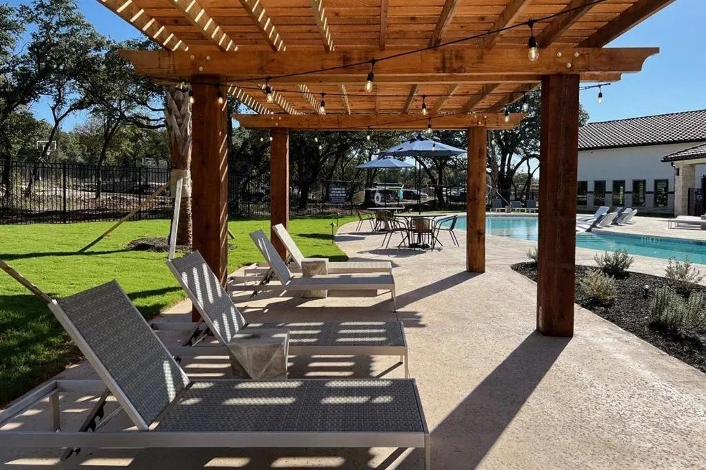 poolside view of Avery Oaks in Austin, TX