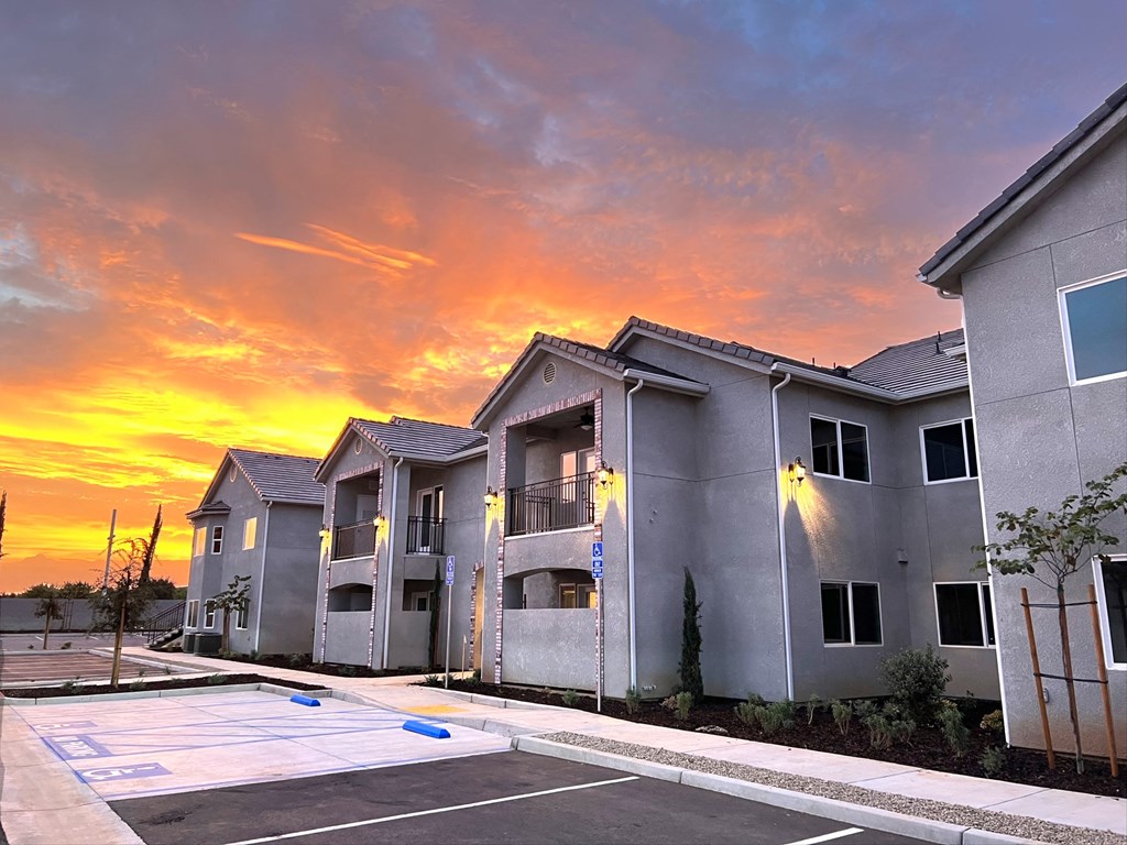Exterior Apartment Building with Sunset