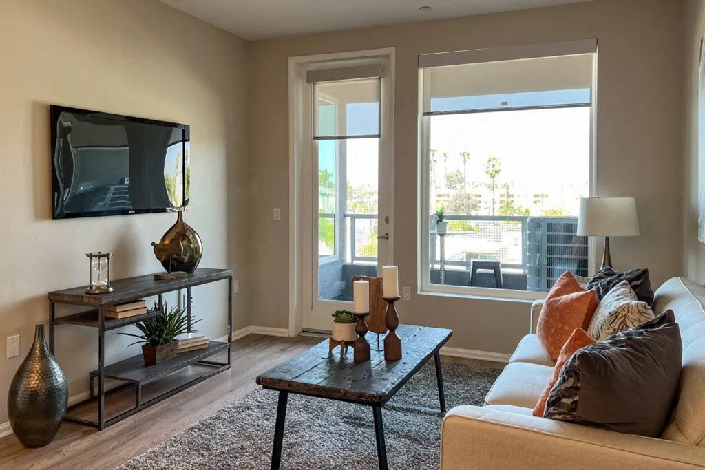 a living room with a couch and a television