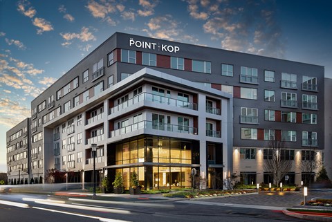 A modern building with the name "POINT KOP" on the top.