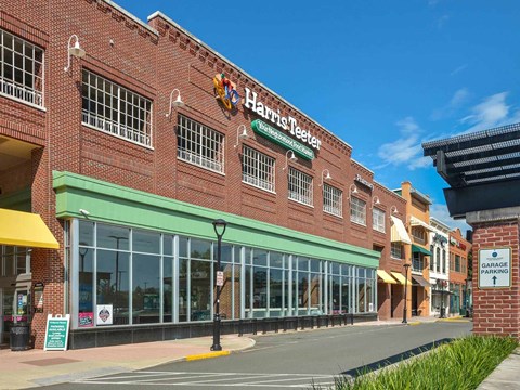 A Harris Teeter store is located in a strip mall.