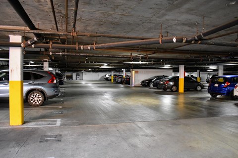 a parking garage with cars