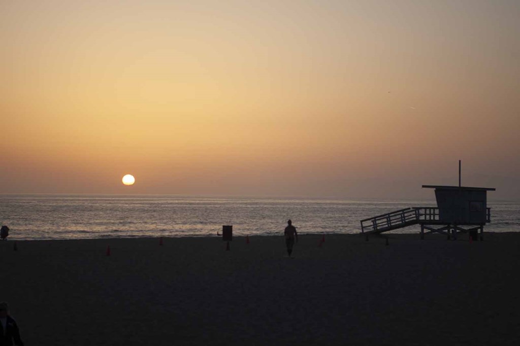 View of the beach at sunset