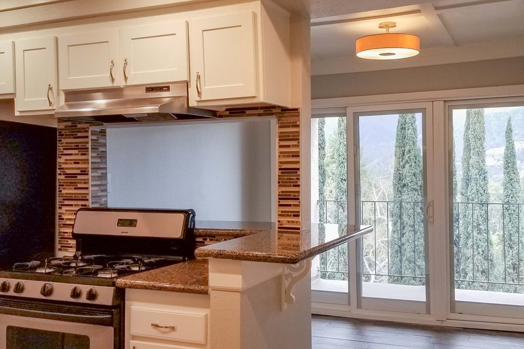 a kitchen with a stove