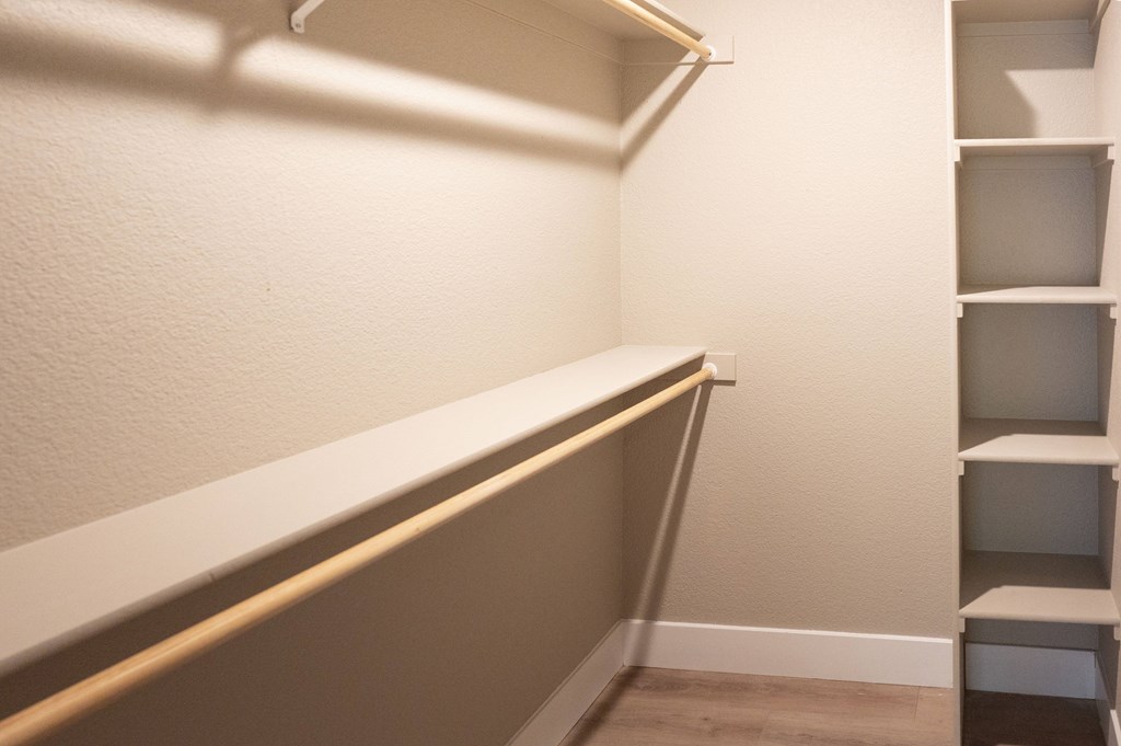 Empty shelves in a room with white walls at Sierra Oaks Living Apartments, Cameron Park, California