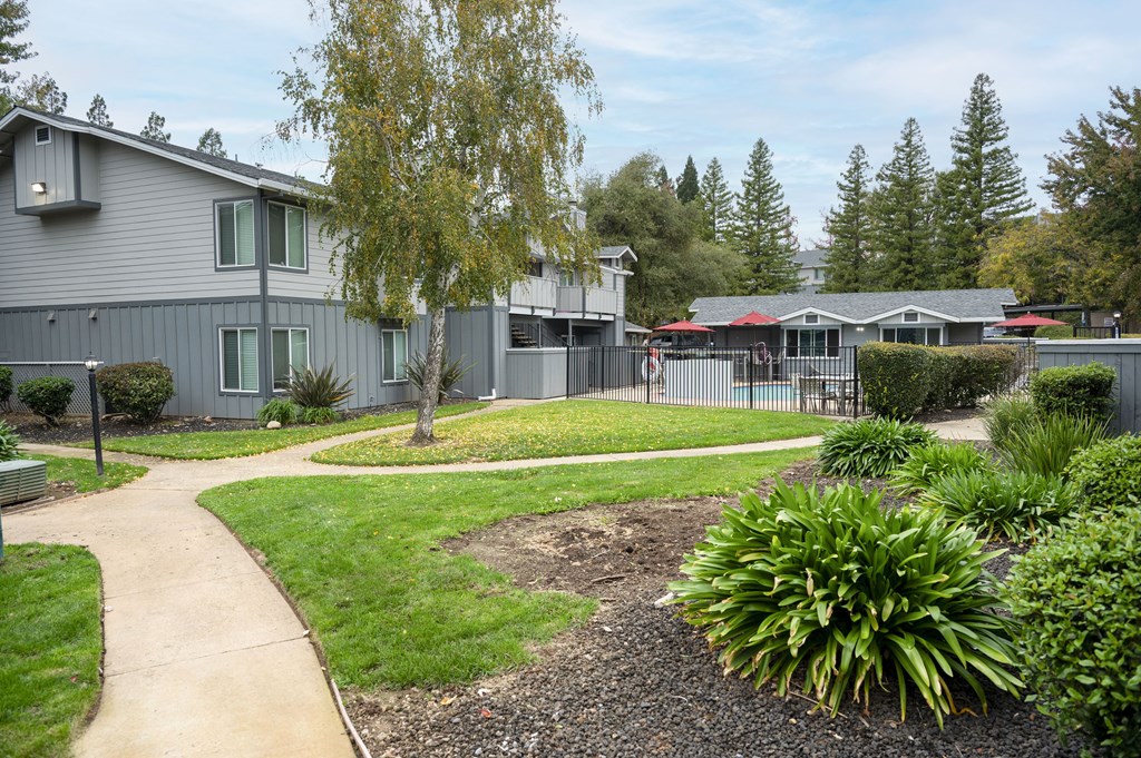 A residential area with houses and a playground at Sierra Oaks Living Apartments, Cameron Park, CA 95682