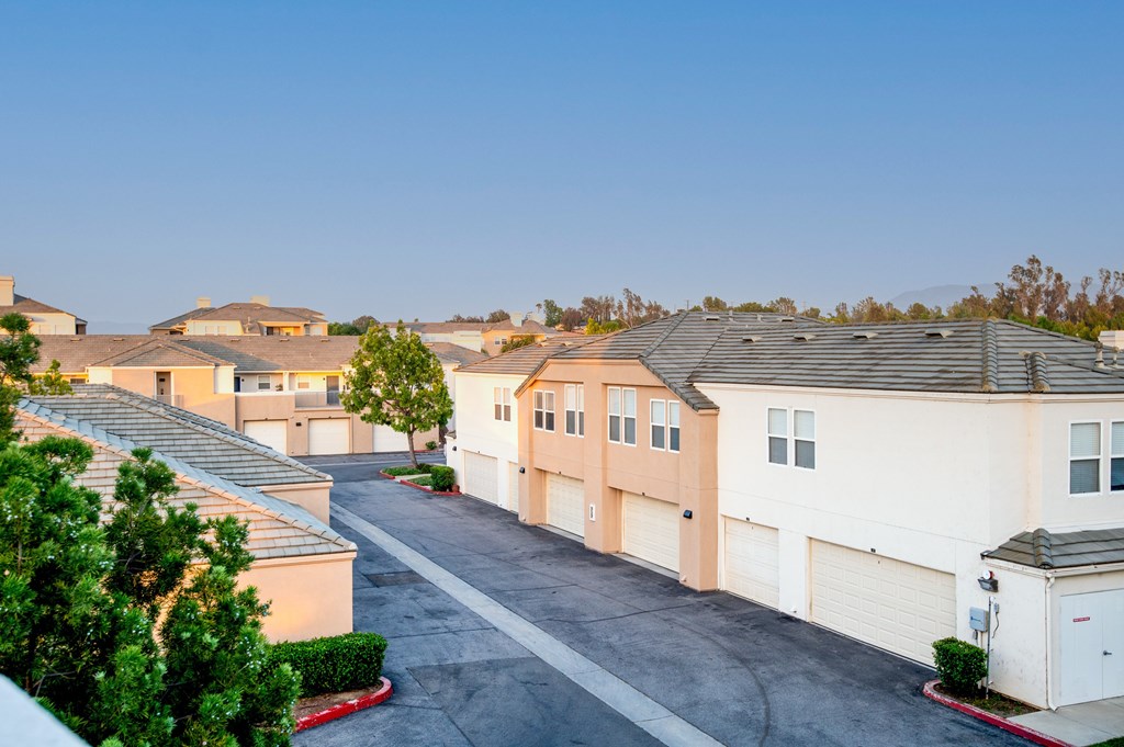 A residential area with houses and driveways.
