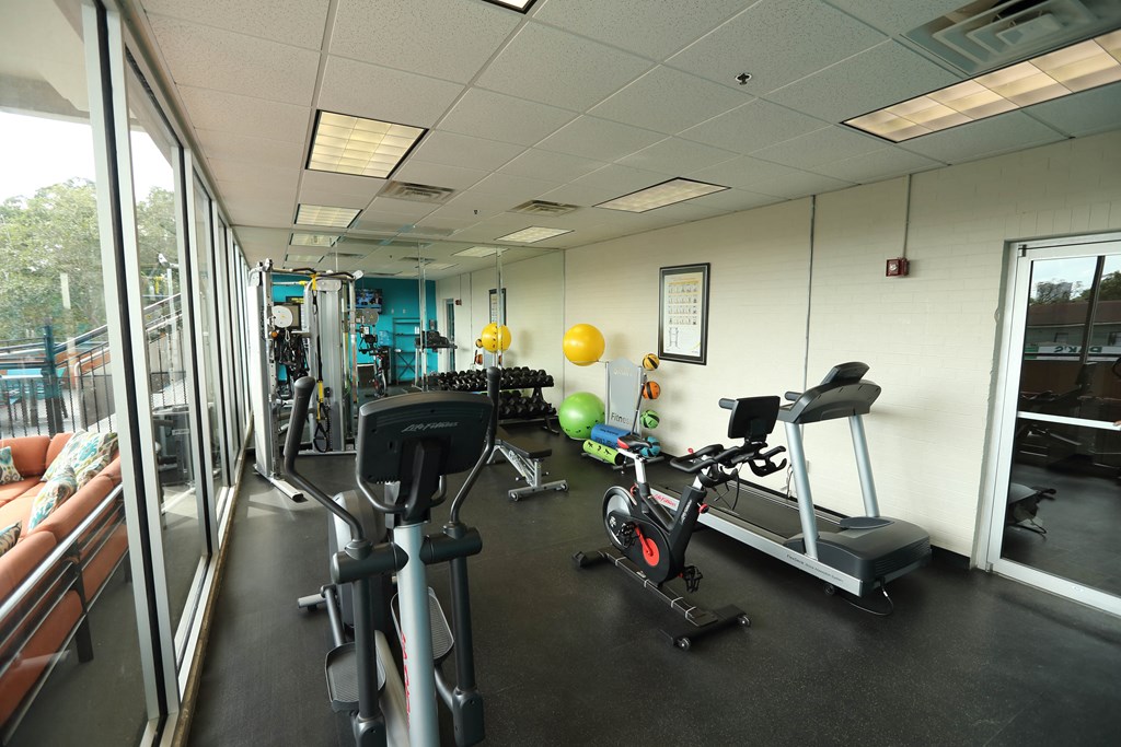 Fitness Center with cardio and wait machines available for all residents