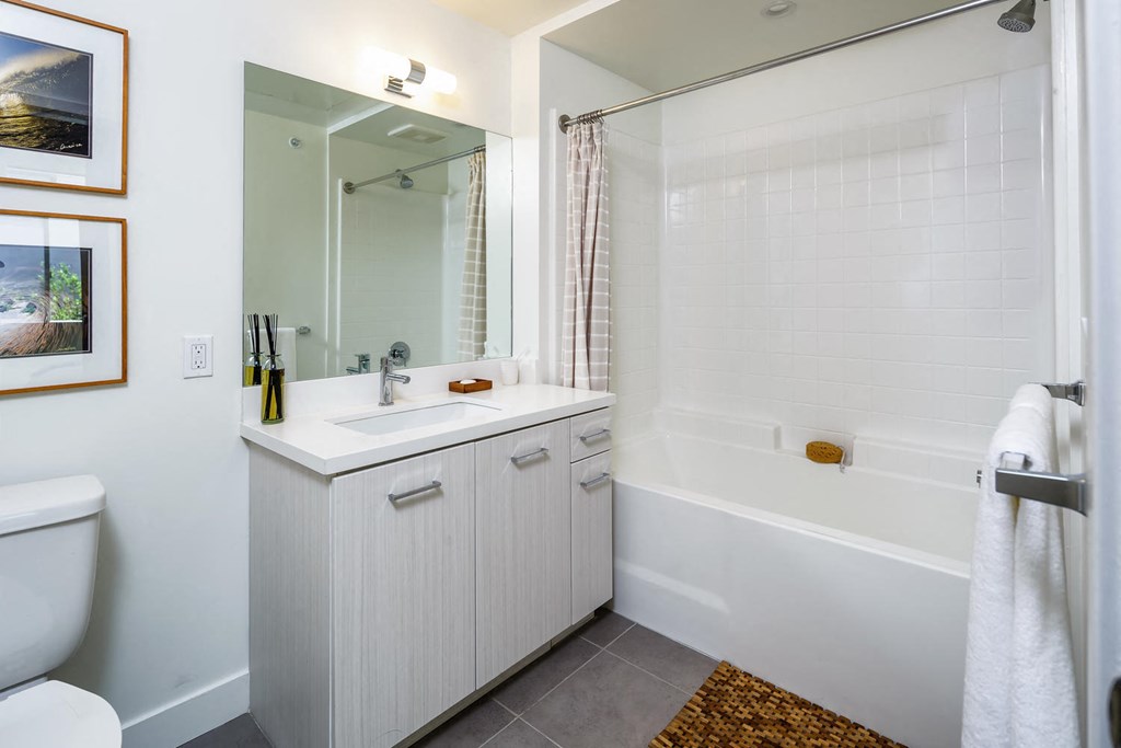 a bathroom with a sink and a shower