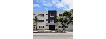 A white and blue building with the number 7278 on it.