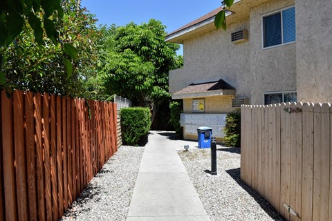 View of sidewalk leading to mail area