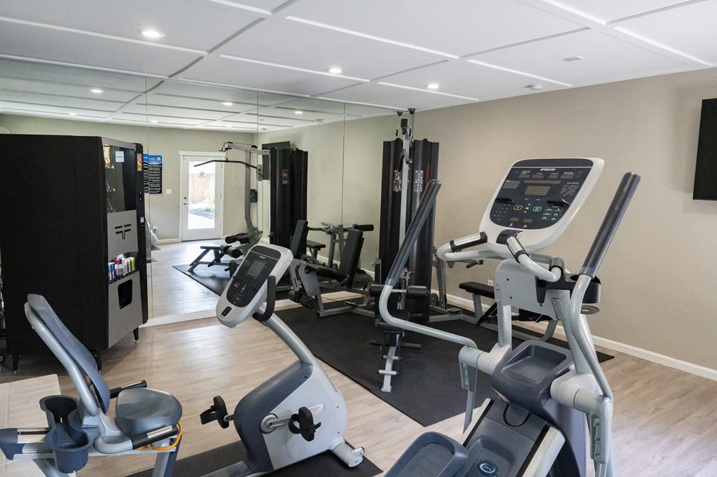 Community fitness canter View of community fitness center with stationary bike and weight machines