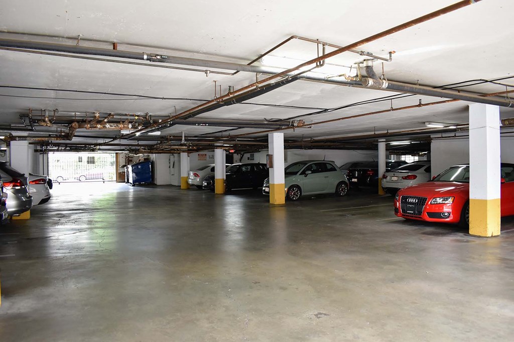 a parking garage with cars parked in it