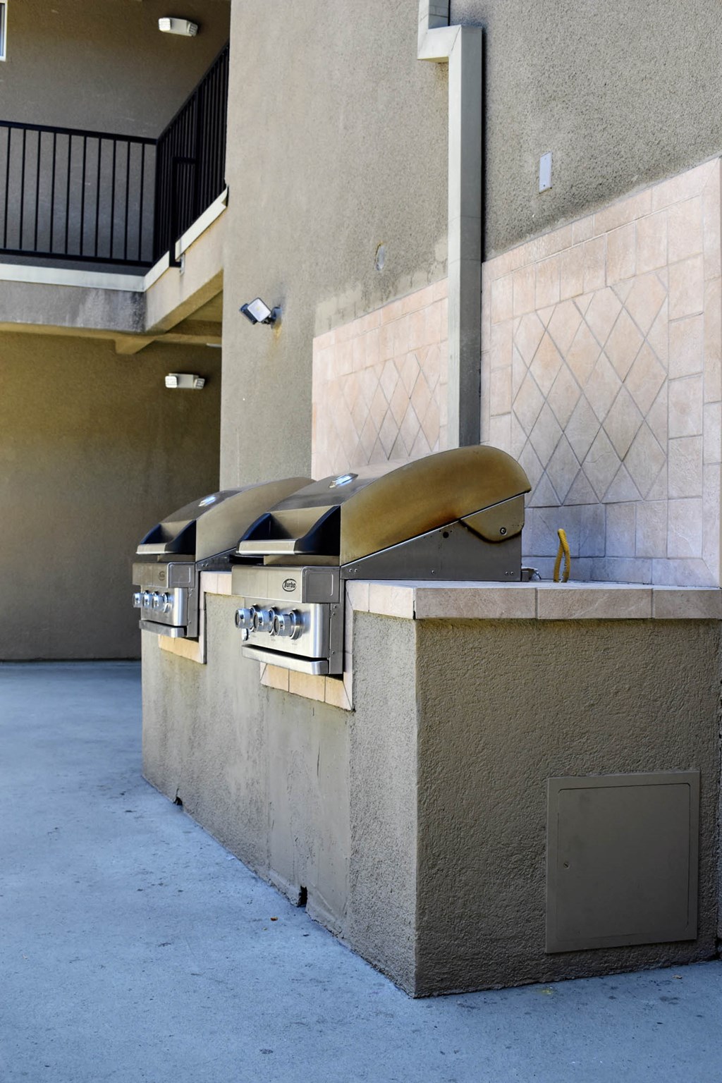 an empty barbecue grill in an empty building