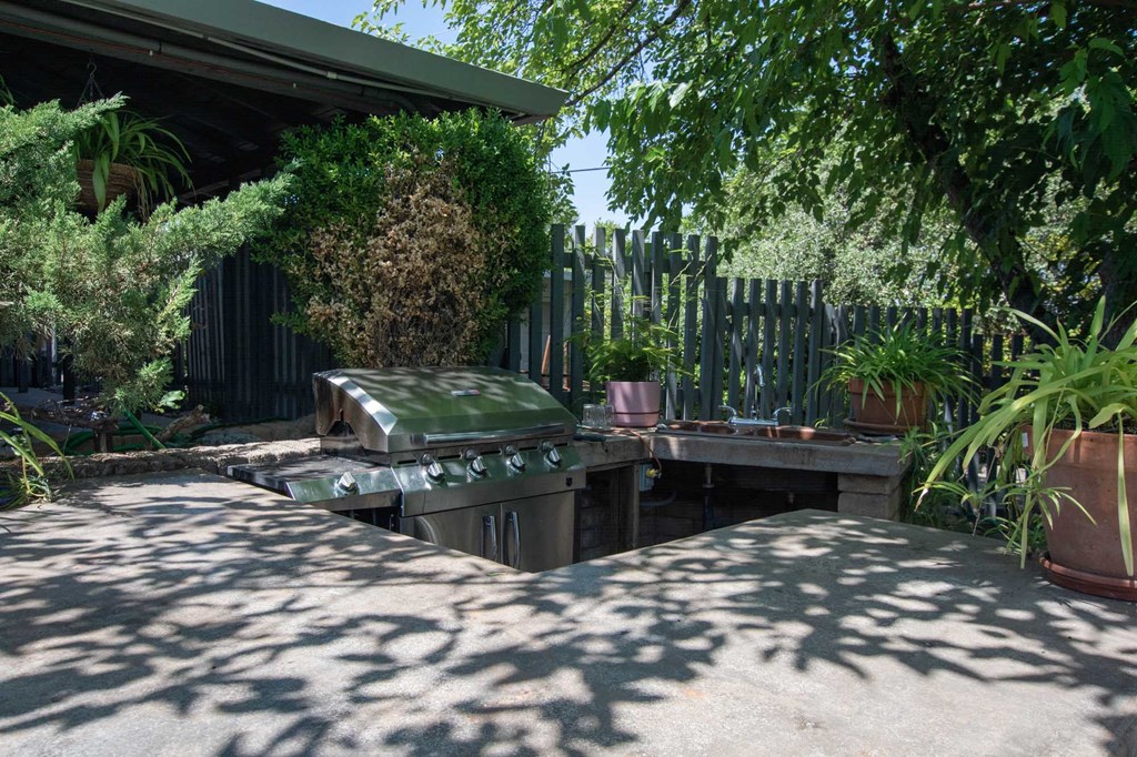 BBQ area at Driftwood Village with gas grill