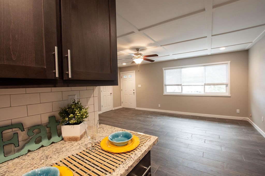 View from kitchen to living room with wood floors