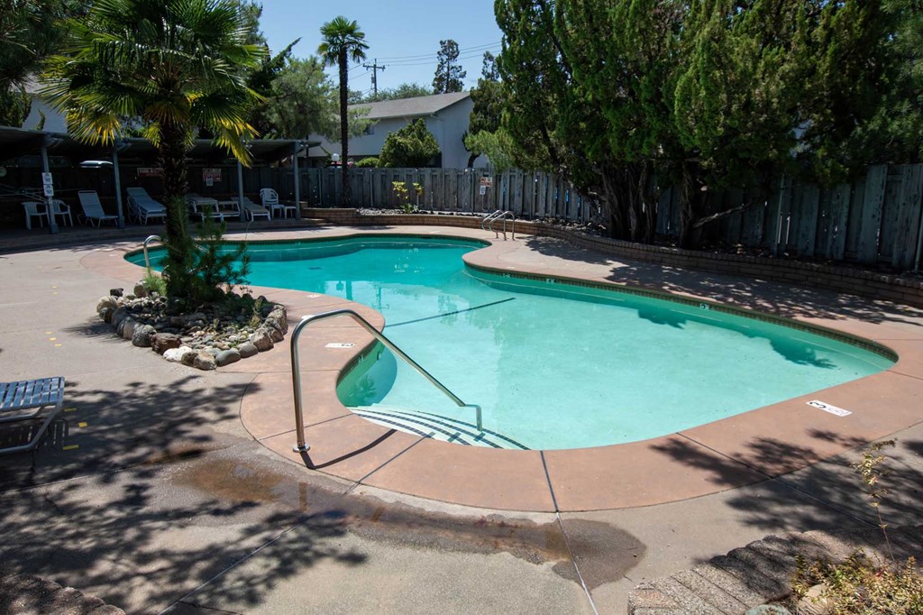 Pool at Driftwood Village with steps and handrail