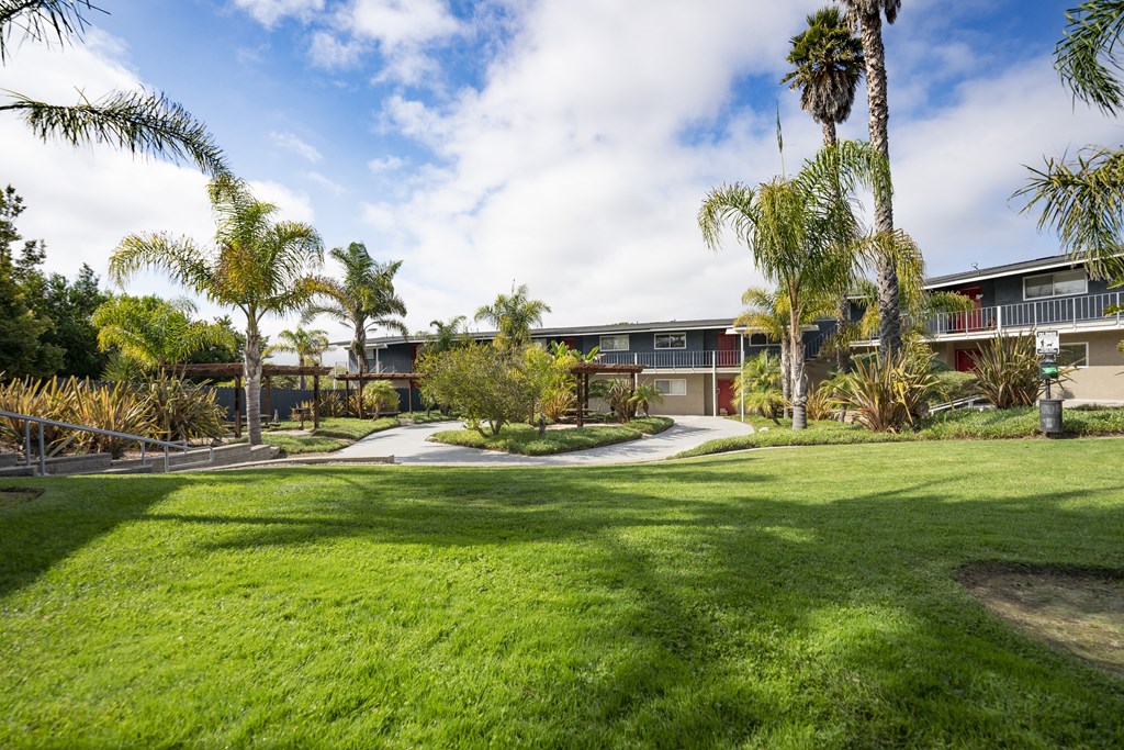 addibuilding iimage with grass area at the Diplomat