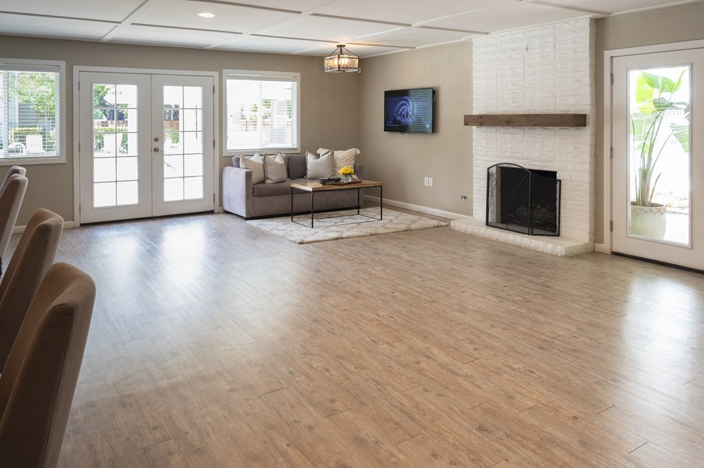 Driftwood office with a wood floor and a fireplace