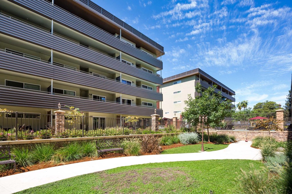 a view of a building with a pathway in front of it